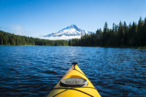 Kayak in Trillium lake, Mt. Hood, Oregon