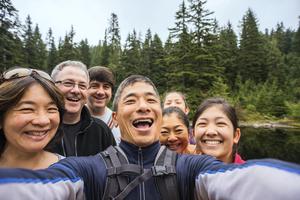 Hikers taking a fun selfie at Mirror lake at Mt Hood